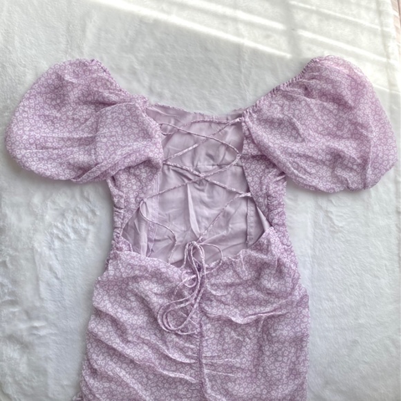 NWT Red Dress Boutique Purple Puff Sleeve Dress w/ Lace Up Open Back - Picture 10 of 16